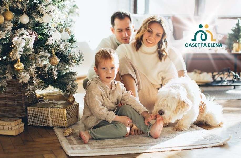 famiglia felice sotto l'albero